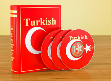 turkish-language-textbook-with-flag-turkey-cd-discs-wooden-table-3d-rendering_808337-11255
